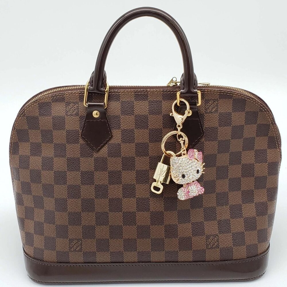Authentic Louis Vuitton Lock&Key w/unbranded Hello Kitty Bagcharm 012026 - Picture 2 of 6